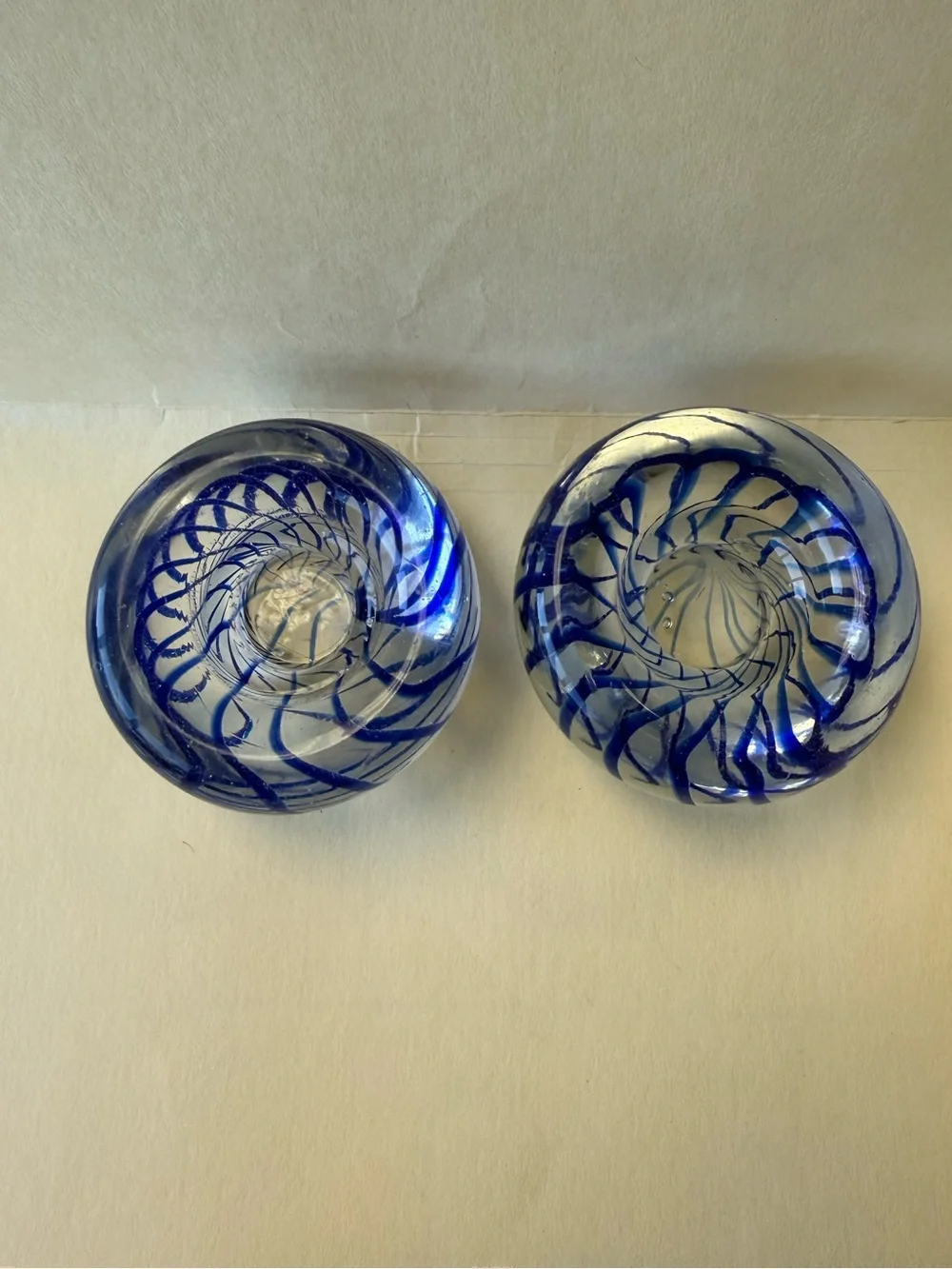 Pair of Handmade Art Glass Paperweight Candle Holders. Clear with Blue Swirl.